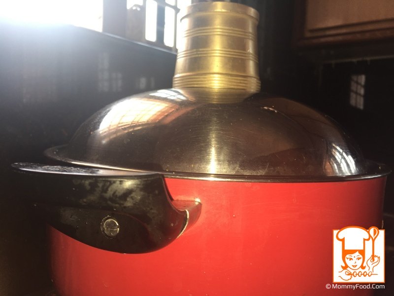 Close the lid tightly by putting weight on lid or closing with dough round the lid. Let it cook on high flame for 5 minutes