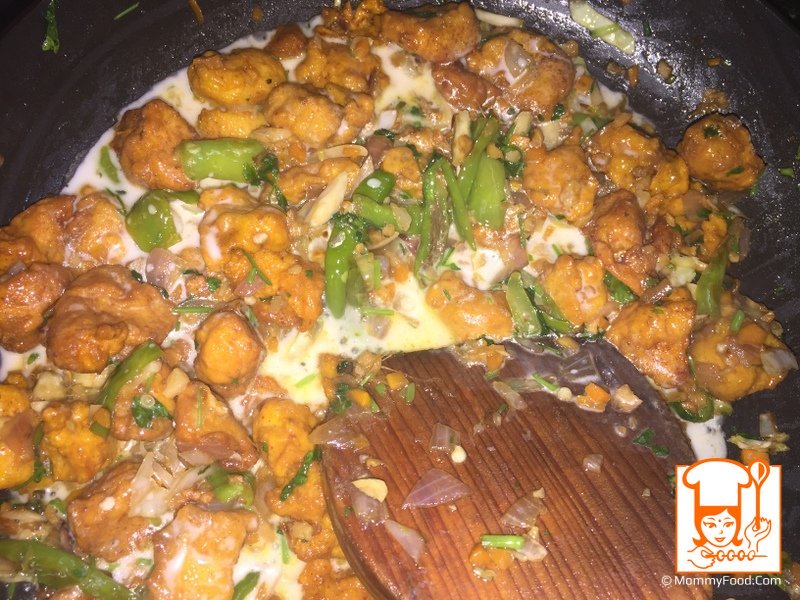 Step 10: Add corn starch to it, stir fry for 2 minutes to the required thickness